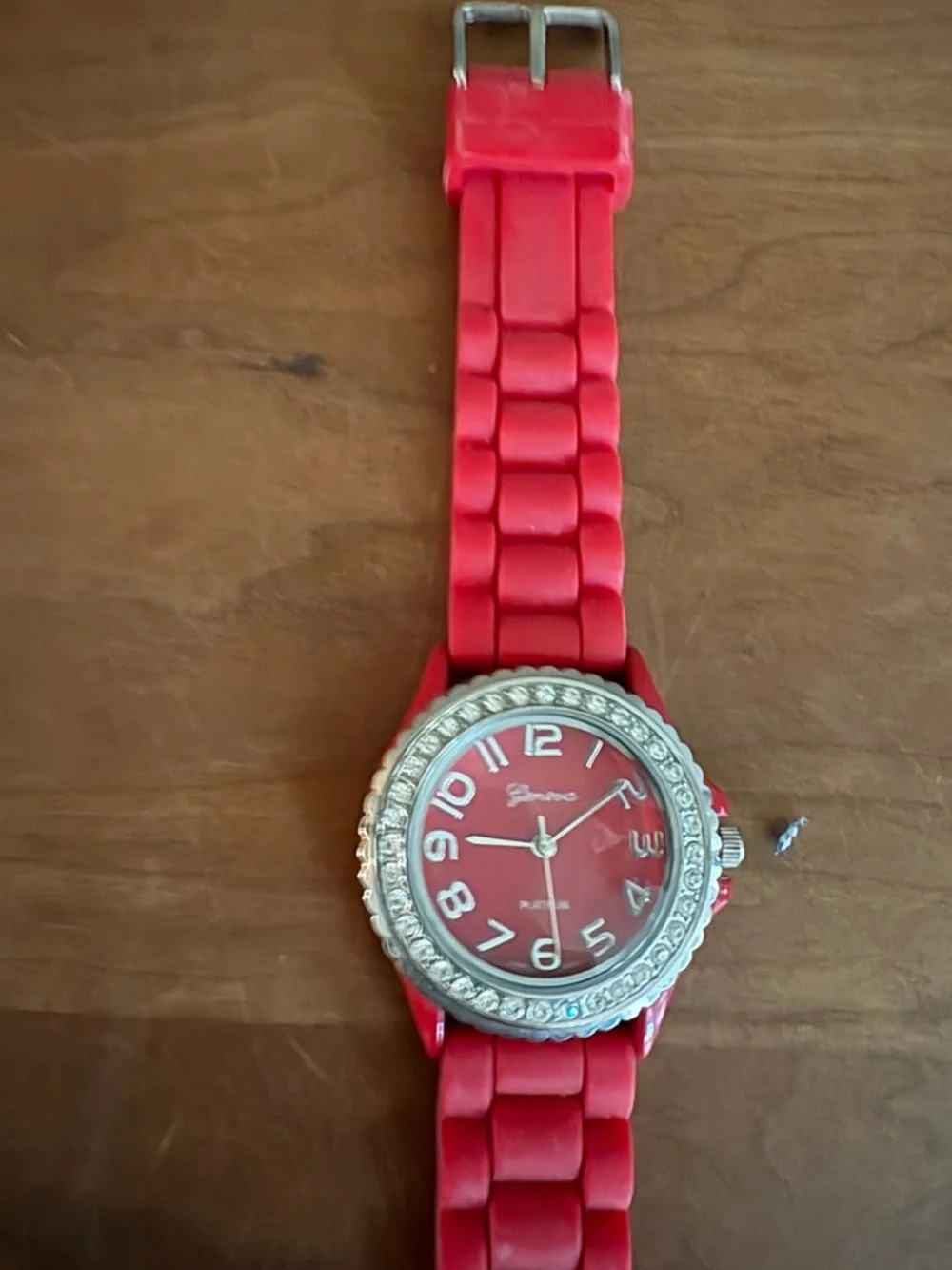 Geneva Platinum Red Dial Crystal Bezel Red Rubber Band Watch - needs Battery
